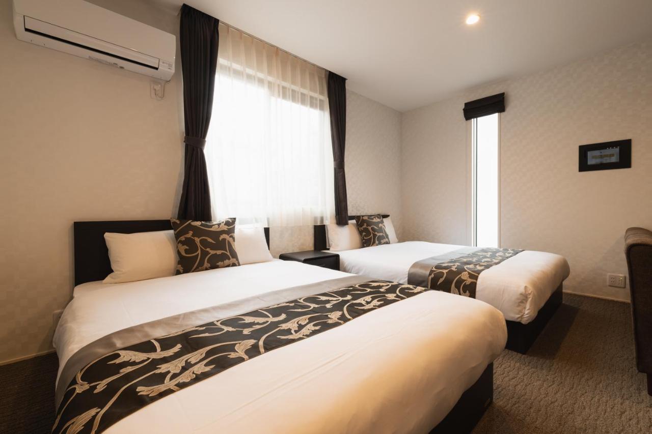 Grand Base Nagasaki Ekimae Aparthotel Kültér fotó
