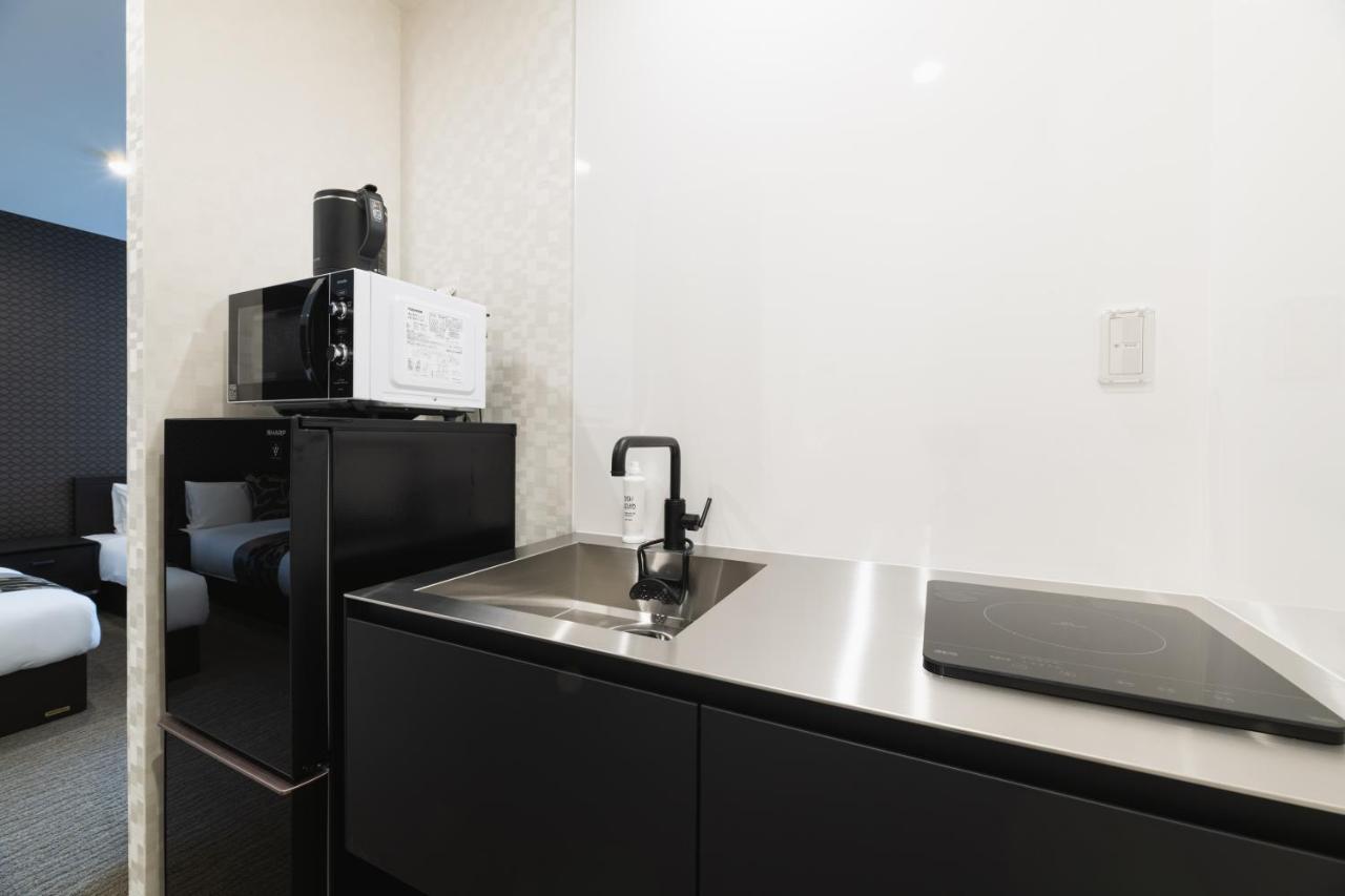 Grand Base Nagasaki Ekimae Aparthotel Kültér fotó